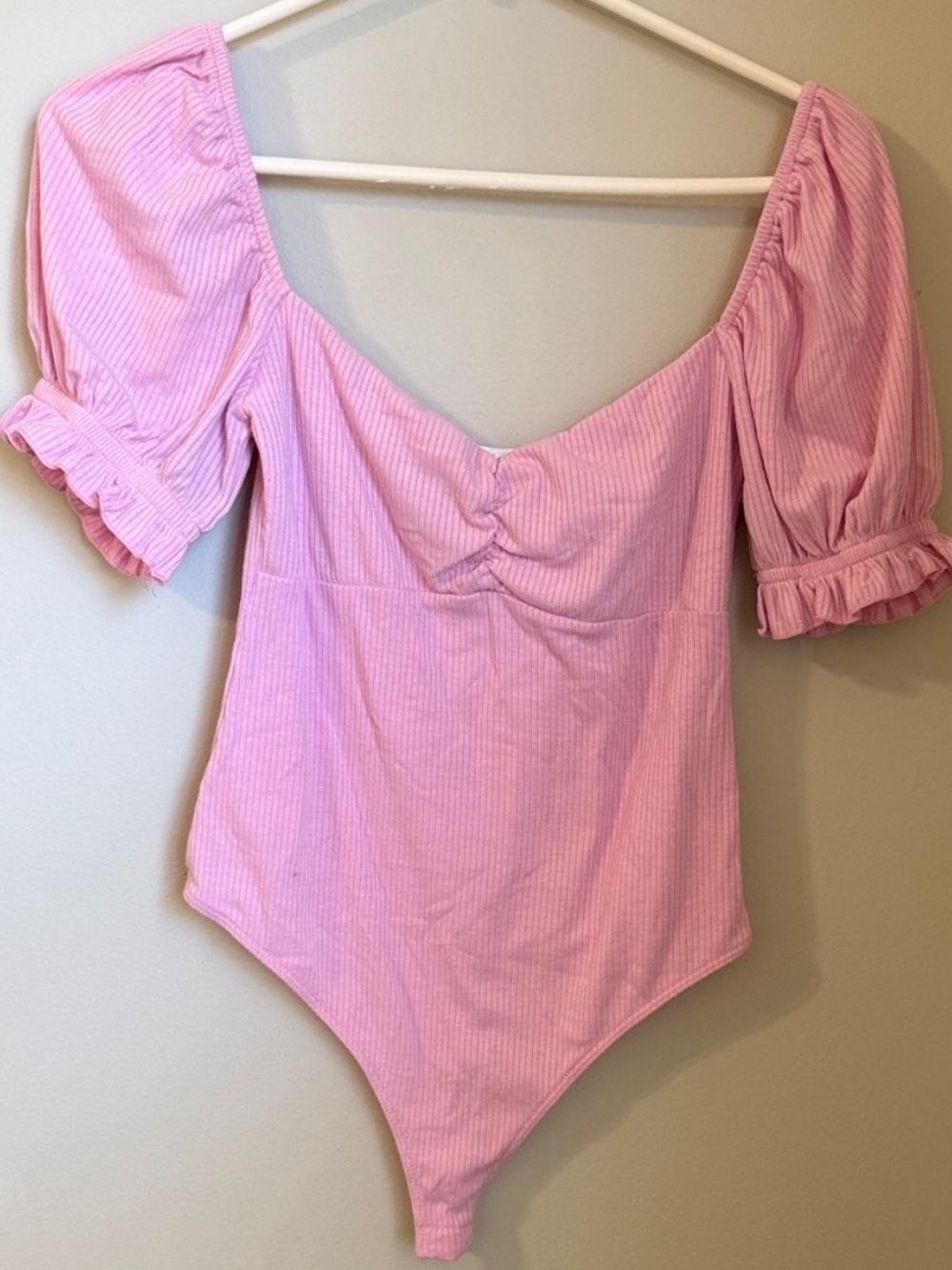 vestique Light Pink Puff Sleeve Bodysuit with Ruffle Trim